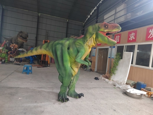 Volwassen dinosaurus kostuum wandelende dinosaurus film rekwisieten toont groene T-Rex